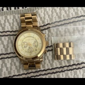 Michael Kors men/women’s gold watch